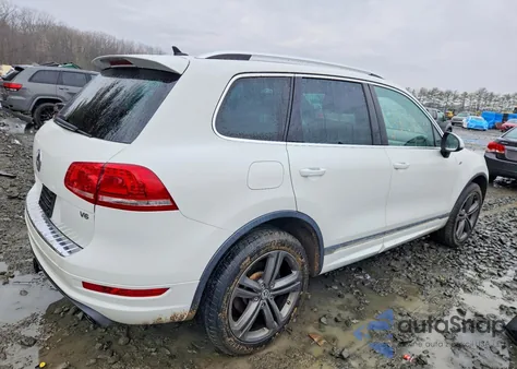 2014 Volkswagen Touareg V6 z USA, uszkodzony, nr VIN WVGDF9BP3ED006854